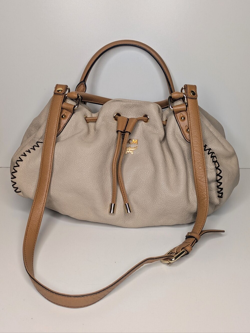 MCM Pebbled Leather Bucket Bag Drawstring Snap Close Cream Tan Tote Shoulder Bag